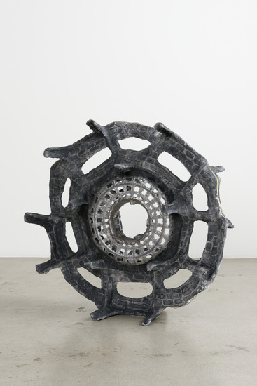 Sculpture 2 of 4 titled Untitled (Tire/Wheel), Plastic chairs, resin, wire, hardware, plaster, aluminum, graphite, and colored pencil, accession number 2017.64.