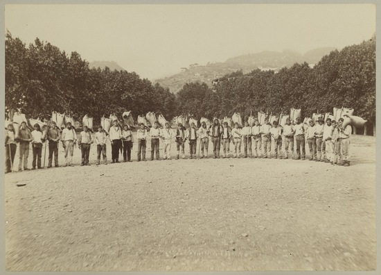 Photograph titled Untitled (Men carrying harvested crop), albumen, accession number 2005.3.33.14.b.