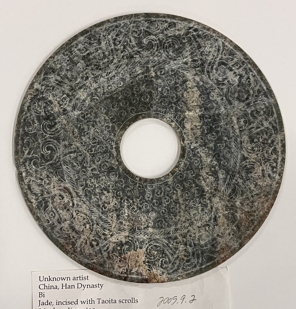 Artifact titled Bi, Jade, incised with Taoita scrolls, accession number 2005.9.2.