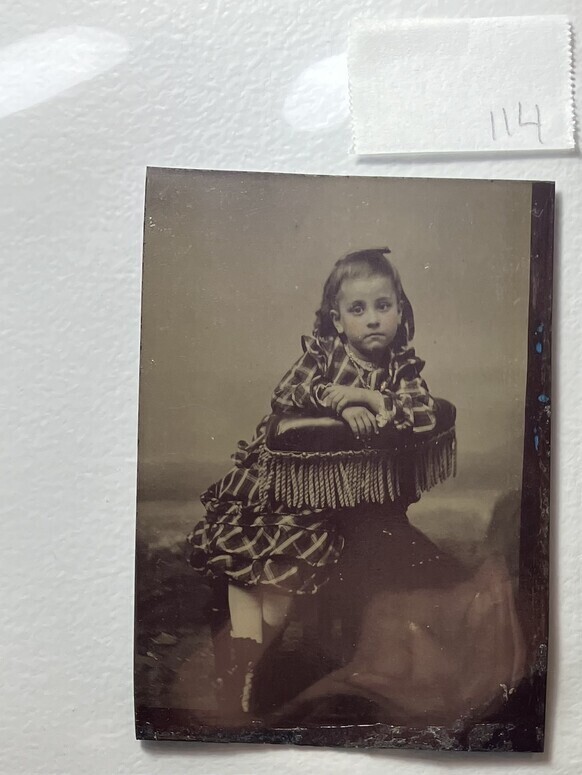 Untitled (Portrait of a Young Girl Leaning on a Fringed Stool)