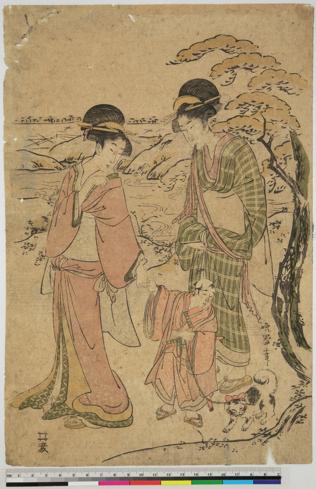 Two women walk by a river with a boy who has a pet dog on a leash