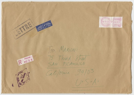 Work on paper 3 of 4 titled Letter to Tom Marioni from Daniel Buren (Vision), typewritten text, blue and green ink, and graphite on paper, two pages; black and green ink, two stickers, stamp marks in black and purple ink, postmarks, and one metered stamp on brown paper envelope, accession number 1995.46.235.a-c.