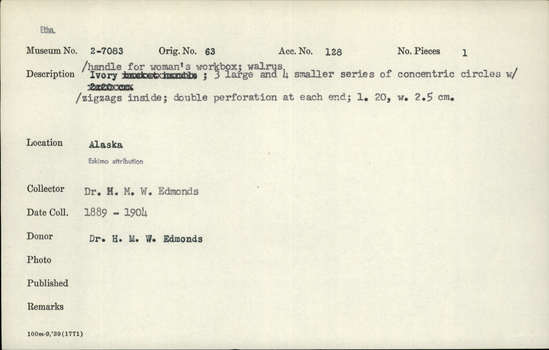 Documentation associated with Hearst Museum object titled Handle, accession number 2-7083, described as For woman's workbox.  Made of walrus ivory.  3 large and 4 smaller series of concentric circles with zigzags inside.  Double perforation at each end.