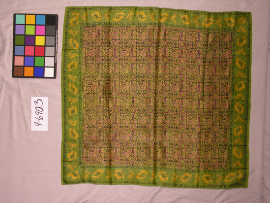 Hearst Museum object titled Scarf, accession number 9-6903, described as Scarf; yellow, cerise, black silk screen on green silk; 31 by 33 1/2”