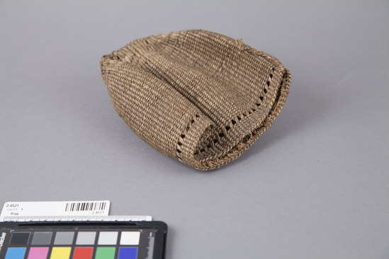 Hearst Museum object 3 of 4 titled Bag, accession number 2-4521, described as Basketry bag; twined, one row has crossed warps, conical; grass.