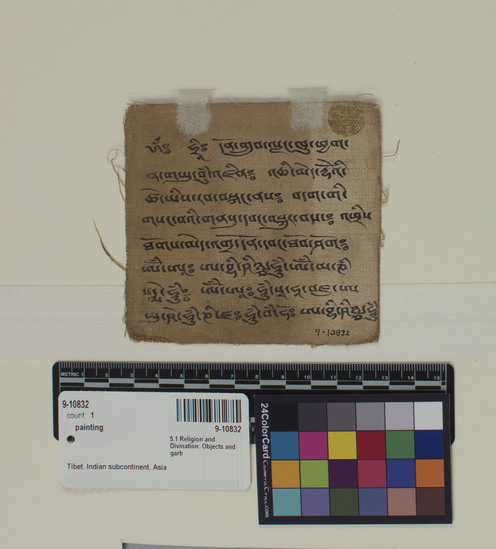 Hearst Museum object titled Painting, accession number 9-10832, described as painting, miniature votive; canvas, ink, paint; Buddha seated on lotus; inscription (Tibetan) on back of picture; reds, green, blue; So-called xylograph illumination; for prayer, meditation, contemplation; a Buddha of the Amitabha type, with hands in the meditative position