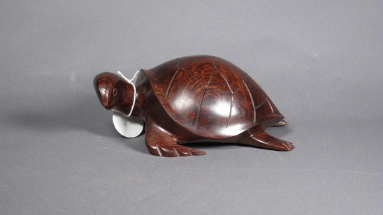 Hearst Museum object titled Turtle figurine, accession number 3-30494, described as wood turtle; polished, dark finish.