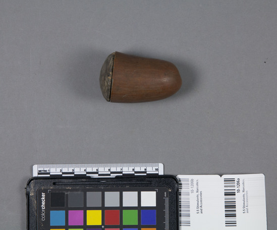 Hearst Museum object titled Plant material container and lid, accession number 10-1206a,b, described as a) Small gourd shell container with (b) wooden lid; button shape; 2⅝ inches.