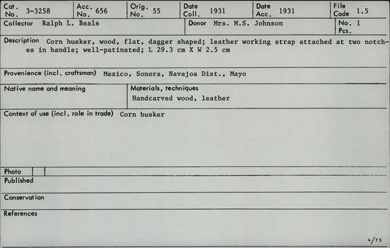Documentation associated with Hearst Museum object titled Knife, accession number 3-3258, described as Corn husker, wood, flat, dagger shaped; leather working strap attached at tip two notches in handle; well- patinated; L 29.3 cm x W 2.5 cm