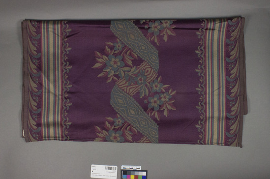 Hearst Museum object titled Textile, accession number 2-62474, described as Strip; rayon or silk?, damask, varicolored, floral and leaf motives, Jacquard looms