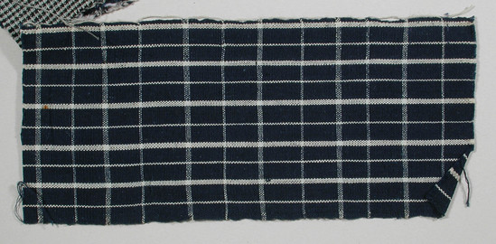 Hearst Museum object titled Textile fragment, accession number 5-11156, described as Textile sample (section of narrow band weaving): Navy ground with white stripes in warp and weft.