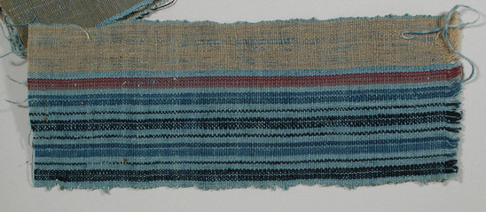 Hearst Museum object titled Textile fragment, accession number 5-11158, described as Textile sample (section of narrow band weaving): one side has panel of tan; other side of light blue with one maroon, several medium blue, and many navy stripes.