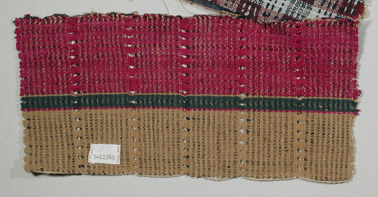 Hearst Museum object titled Textile fragment, accession number 5-11345, described as textile sample (section of narrow band weaving): floats and openwork on red and tan background with green central stripe.