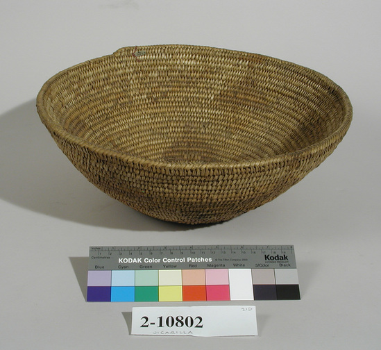 Hearst Museum object 1 of 3 titled Basket, accession number 2-10802, described as Round, coiled, pale brown and yellow decoration, geometric pattern.