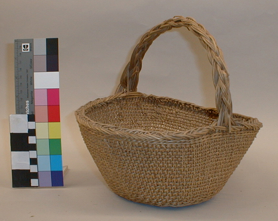 Hearst Museum object titled Basket, accession number 2-56552, described as Twined with handle; willow shoot warp and weft; handle is of same material, braided, in form of arch.