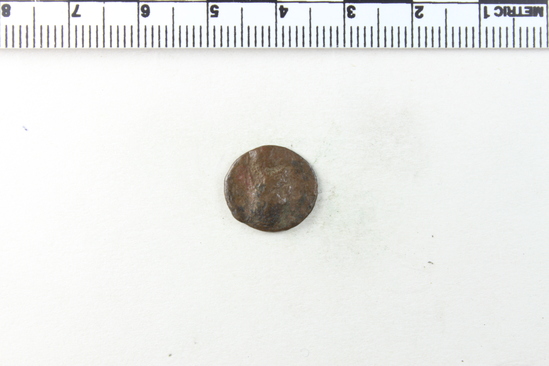 Hearst Museum object 5 of 6 titled Coin: æ, accession number 8-4819, described as Coin; AE; Greek. 1.25 grams, 14 mm. Sinatruces, 77-70 BC. Parthia. Obverse: bust of Sinatruces l. bearded, helmeted, diademed, cuirassed. Reverse: bow in case. Remarks:  "inscription:- just escapes legibility (surrounds bow case).