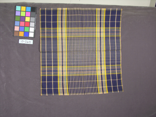 Hearst Museum object titled Turban, accession number 10-262, described as Chief’s turban; cotton; plain weave; blue, varicolored plaid; 33 x 31  1/2 inches.