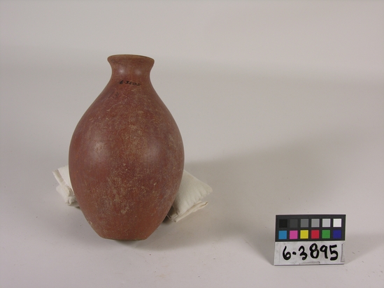 Hearst Museum object titled Broken bottle, accession number 6-3895, described as Pottery: red bottle, neck broken; ld 5 cm, height 21 cm.