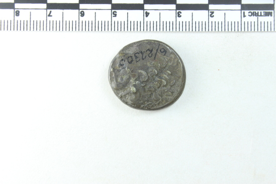 Hearst Museum object 5 of 10 titled Coin: billon tetradrachm, accession number 6-22305, described as Coin, silver base. Diameter 23 mm. Weight 14.45 grams. Condition fair. Denomination: silver base tetradrachm. Obverse description: Head of Ptolemy I, facing right, diademed, aegis around neck, border of dots. Reverse description: [inscription] Eagle on thunderbolt, border of dots. Mint date: Alexandria, year 20, reign of Ptolemy XI, Alexander I.