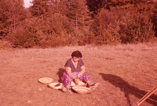 Hearst Museum object titled Color slide, accession number 25-5263, described as Essie Parrish grinding acorns.