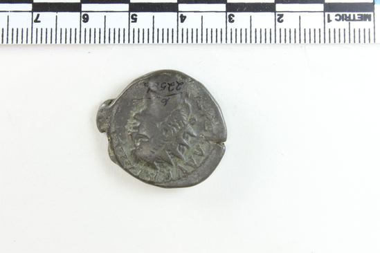 Hearst Museum object titled Coin: billon tetradrachm, accession number 6-22586, described as obverse: head of Nero, right. radiate reverse: bust of Alexandria to right