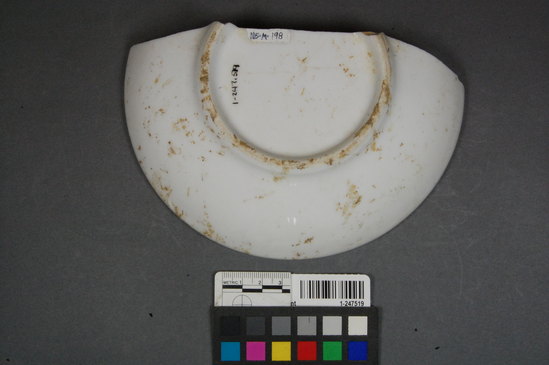 Hearst Museum object titled Plate fragment, accession number 1-247519, described as Ceramic bowl rim; base refined white earthenware