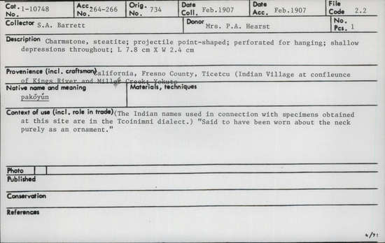 Documentation associated with Hearst Museum object titled Charmstone, accession number 1-10748, described as Made of steatite.  Projectile point-shaped, perforated for hanging.  Shallow depressions throughout.