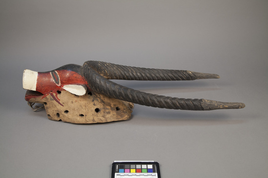 Hearst Museum object 2 of 4 titled Mask, accession number 5-3317, described as Carved wooden mask. Antelope head with long horns. Painted red, white and black. L = 28.25”.