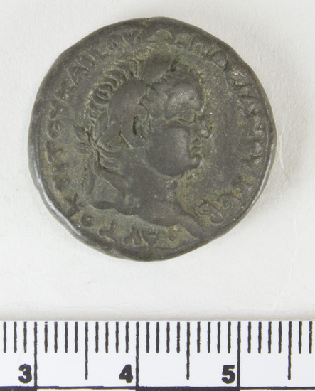 Hearst Museum object 5 of 6 titled Coin: billon tetradrachm, accession number 6-22641, described as Obverse; Head of Titus, right, laureate.  Reverse; Homonoia seated left.