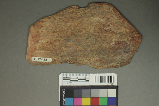 Hearst Museum object titled Stone slab, accession number 2-37022, described as Platy schist discolored by burning; fragment, probably a frying stone, very common to the sites