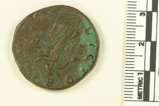 Hearst Museum object 1 of 2 titled Coin: æ sestertius, accession number 8-9456, described as Æ sestertius. Maximinus Thrax. Obverse: Head. Reverse: Victoria Augusti