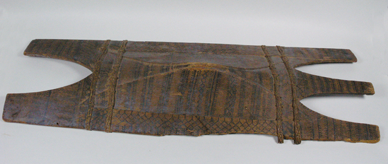 Hearst Museum object titled Shield, accession number 10-1274, described as Wooden Shield; rectangular; 3 prongs on top, 2 on bottom; black-painted linear design on front; 2 bands plaited rattan top and bottom; 37 x 11 3/8”