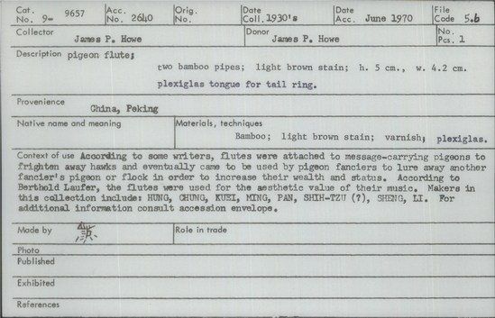 Documentation associated with Hearst Museum object titled Pigeon flute, accession number 9-9657, described as pigeon flute; 2 bamboo pipes, light brown stain, ht. 5 cm, w. 4.2 cmplexiglas tongue for tail ring