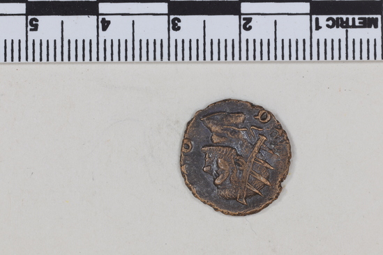 Hearst Museum object 7 of 8 titled Coin: æ, accession number 8-9292, described as Obverse: Claudius II Gothicus. Reverse: Consecratio. Mint Data: 268-270 AD.