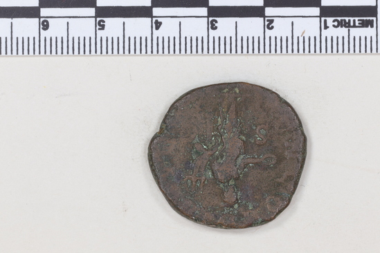 Hearst Museum object 7 of 8 titled Coin: æ sestertius, accession number 8-5912, described as Coin: Sestertius?; Æ; Tribonianus.Gallus - 14.55 grams. Rome, 251-253 AD. Obverse: [IMP CAES C VIBIVS TREBONIANVS GALLVS AVG] - Bust laureate, draped, facing right. Reverse: CONCORD[IA AVGG], SC - Concordia standing facing left holding patera in outstretched right hand, double cornucopiae in left.