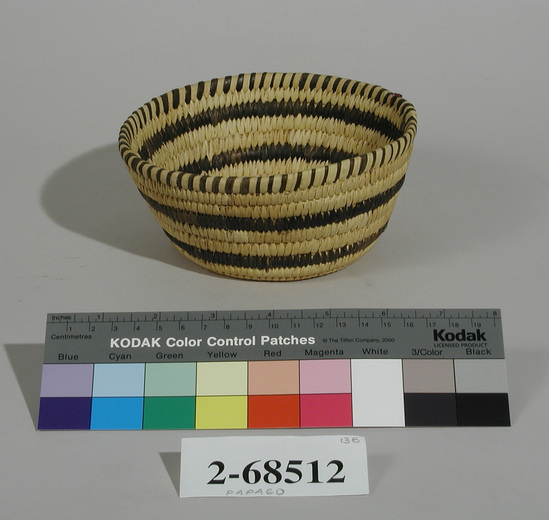 Hearst Museum object titled Basket, accession number 2-68512, described as Round with flat base, circular stripes in dark brown on cream ground.  Bear grass warp, yucca weft, coiled.