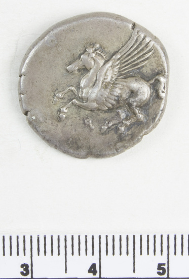 Hearst Museum object 10 of 10 titled Coin: ar stater, accession number 8-5484, described as Coin; AR; Stater; Greek. 8.4312 grams, 23 mm. 400-338 BC. Corinth, Greece. Obverse: Pegasus with pointed wings flying l.; below, Ϙ. Reverse: Head of Pallas l. helmeted; in field, ΔΙ; to right, Artemis (Latin: Diana) running l., holding long torch with both hands. Remarks: "condition, excellent.