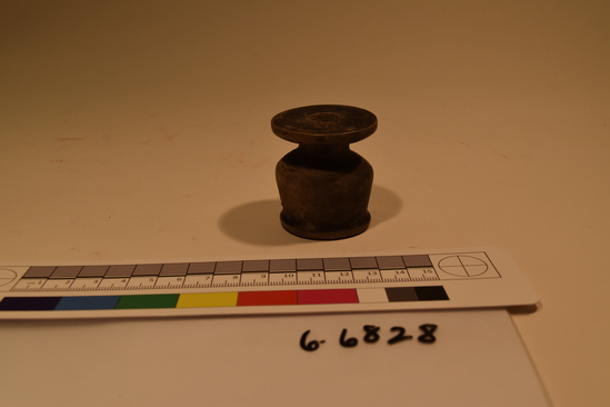 Hearst Museum object titled Jar, accession number 6-6828, described as Limestone jar, small, pointed, black flanged rim. gd 4 1/2 sd 4 h 4 1/2 cm.