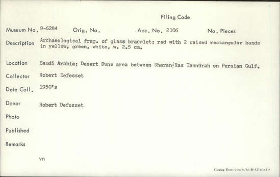 Documentation associated with Hearst Museum object titled Bracelet, accession number 9-6284, described as Archaeological fragment of glass bracelet; red with 2 raised rectangular bands in yellow, green, white.