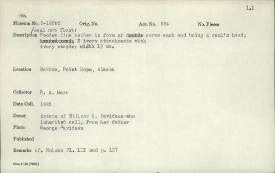Documentation associated with Hearst Museum object titled Net float, accession number 2-19290, described as Seal net float. Wooden line holder in form of curve, each end being a seal's head. 2 Ivory attachments with ivory staple.