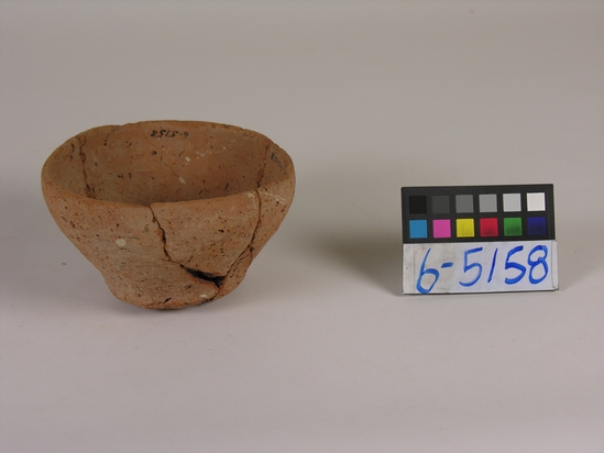 Hearst Museum object titled Broken bowl, accession number 6-5158, described as Pottery: coarse reddish brown bowl broken; diameter 12 cm, height 8 cm.