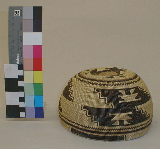 Hearst Museum object titled Basketry cap, accession number 1-164418, described as Twined basketry, black designs.