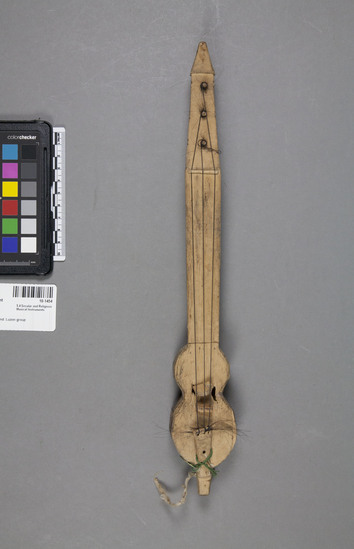 Hearst Museum object 1 of 4 titled Musical instrument, accession number 10-1454, described as Small 3-stringed violin; one pieced; incised decoration; 14 1/8” 1. Bow is 10-1759