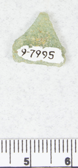 Hearst Museum object titled Glass fragment, accession number 9-7995, described as Glass fragment; green.