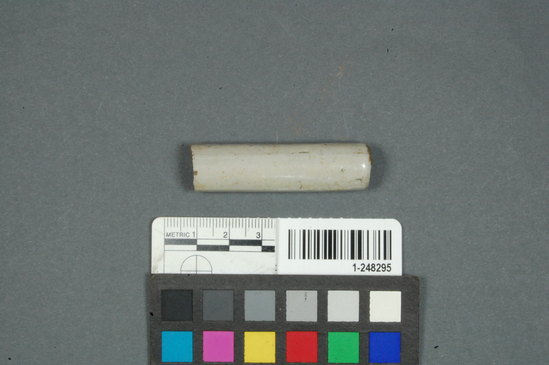 Hearst Museum object titled Ceramic pipe fragment, accession number 1-248295, described as Ceramic insulator, fragment(s), tube earthenware