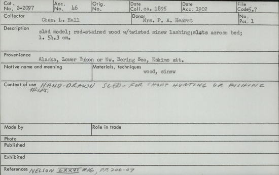 Documentation associated with Hearst Museum object titled Sled model, accession number 2-2097, described as Red-stained wood with twisted sinew lashing; slat across bed.