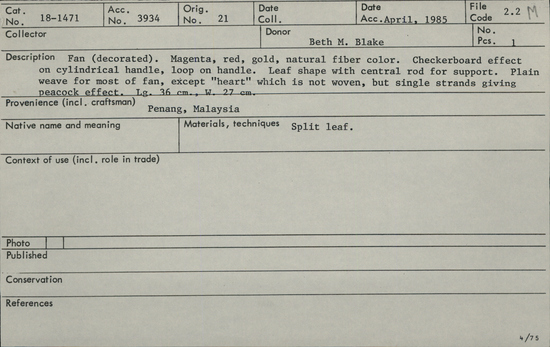 Documentation associated with Hearst Museum object titled Fan, accession number 18-1471, described as Fan (decorated). Magenta, red, gold, natural fiber color. Checkerboard effect on cylindrical handle, loop on handle. Leaf shape with central rod for support. Plain weave for most of fan, except “heart” which is not woven, but single strands giving peacock effect. Length 36 cm. Width 27 cm.