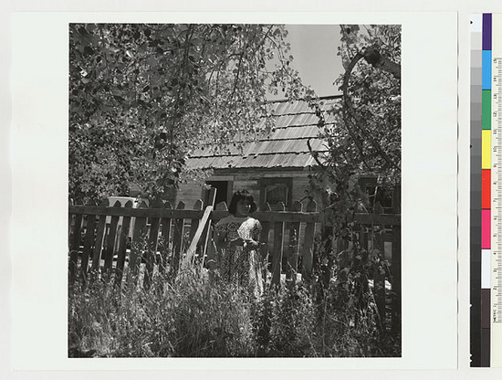 Hearst Museum object titled Black-and-white negative, accession number 15-19579, described as Girl and house