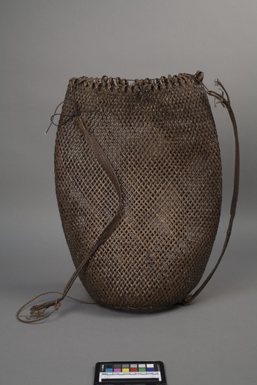 Hearst Museum object titled Basket, accession number 18-1349, described as Basket, open-word back-pack; incorporates two shoulder straps woven of same material as basket; cylindrical. For carrying rather large loads upon the back, ample capacity. Height 54 cm.