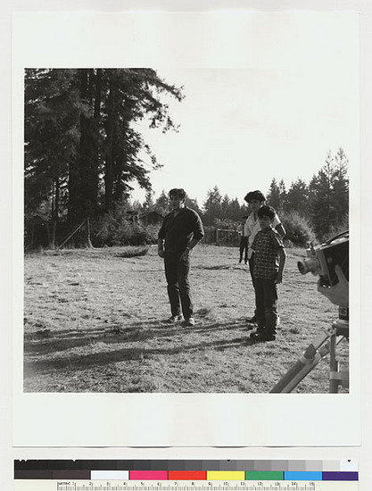 Hearst Museum object titled Black-and-white negative, accession number 15-19558, described as Boys watching Essie Parrish preparing acorn meal